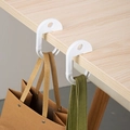 Portable white plastic desk edge bag hook showing holding brown and green bags - Desk Bag Hook 2 Pack