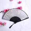 Bamboo folding fan with pink cherry blossom pattern, butterfly design and black tassel - Pink Cherry Blossom Butterfly Style