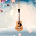 Custom guitar ornament with Name Here text hanging on festive tree with snowy background - Natural Wood with Black
