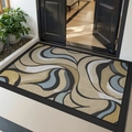 Modern beige and blue wave pattern entry mat with durable non-slip grid surface - Radiant Swirl