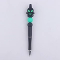 Detail of DIY beadable pen featuring a black cartoon spider figure with green eyes - Green-Eyed Spider