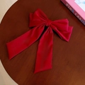 Elegant large red fabric bow hair claw clip with floral mesh and feathers on a wooden table - 167# Red Fabric Large Bow Clip
