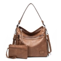 Macro view of brown faux leather tote set featuring multi-zipper pockets and thick strap - Two-Piece Set / Khaki
