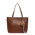 Brown textured leather tote bag with teddy bear charm and silk ribbon on white background - Brown