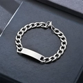 Detailed close-up of a silver stainless steel Cuban link bracelet with a blank ID tag - 2.3 (46x10mm Plate/8mm Width/20cm Length)