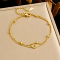 Zweilagiges goldenes Edelstahl-Armband mit Evil Eye Anhänger und Zirkon-Perlenbesatz - Gold (B1754)