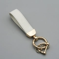 White suede leather keychain with gold metal hardware loop for a luxury business style - White/Gold