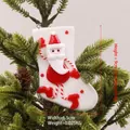 Christmas stocking pendant with Santa Claus figure hanging on a green Xmas tree branch - Santa in Stocking Style E