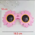 Pink daisy shaped party sunglasses for birthdays, size 18.5 cm width and 10 cm height - Pink Daisy Shape Glasses