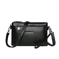 Minimalist black soft leather crossbody bag with multiple zippers and detachable strap - Black