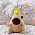 Plush capybara keychain with a yellow pineapple hat accessory for bag decoration - Light Brown Pineapple + Bead Chain
