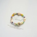 Colorful ceramic bead bracelet featuring natural shells and starfish on white background - Shell Starfish (933A)