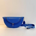 Royal blue crescent crossbody bag featuring lychee grain leather and silver hardware - Blue