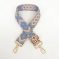 Detail of bohemian geometric purple and blue canvas bag strap with golden metal hooks - Pattern No. 32