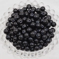 Macro shot of 6mm polished black glass beads piled in a clear glass tray for DIY jewelry - 4mm / Black