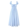 Detail view of the smocked elastic bodice and tie knot on light blue striped puff sleeve dress - S / Light Blue