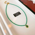 Vintage green faceted emerald bead necklace with oval gemstone pendant in gold setting - Green Oval Pendant Necklace (113#)