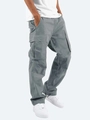 Detail of light gray tactical cargo pants with large side pockets and drawstring hem - Gray