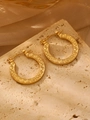 Golden stainless steel hoop earrings with Greek key pattern on a textured stone - 18K Gold Embossed (0737)