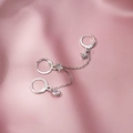 Silver triple hoop earrings with star charm and blue gemstone on pink silk - Silver Triple Linked Star Gem Earrings Set