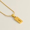 Golden square sand pendant necklace with letter I and elegant snake chain for women - Letter I
