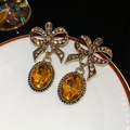 Vintage bow earrings with amber-colored drop stones and brown crystals in antique gold - Vintage Amber Gemstone Bowknot Pendant Earrings (31# Silver Needle - Gold)