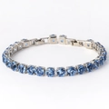 Single row silver tennis bracelet with 6mm round light blue cubic zirconia stones - Blue Zirconia White Gold