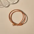 Macro detail of high-elastic braided hair tie in brown gold with dual metal screw-end beads - Dual-strand Simple Style / Ginger Yellow