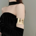 Polished gold wide cuff armlet with irregular metallic pleats on female upper arm - Mirror Wide Arm Cuff (15#)