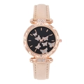 Close-up of women watch with rose gold case, beige strap and rhinestone butterfly dial - Beige