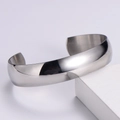 Detailed view of wide silver Mobius cuff bracelet with polished mirror surface - Silver