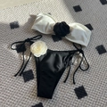 Contrast rose bandeau bikini set with side-tie bottoms in classic black and white - S / Milky White