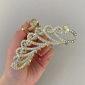 Elegant gold peacock hair claw clip with pearls and crystals for a sophisticated look - Pearl Rhinestone Peacock