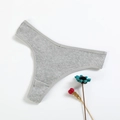 Grey ribbed cotton thong for women, flat lay view on white background with dried flower - L (30) / Gray