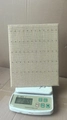 L-shaped jewelry display stand in beige linen texture weighing 236.5g on a scale - Hemp Fabric / L-shaped Small 60 Holes / Hemp Color