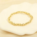 Detailed shot of gold beaded bracelet with alternating polished and textured beads - BR1683-H/Gold Engraved Texture Beads