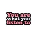 Black enamel pin featuring pink and white 'You are what you listen to' text design - You Are What You Listen To