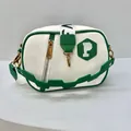 Minimalist white and green crossbody bag with Saffiano texture and metallic P badge - White