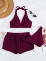 Three-piece striped swimsuit in burgundy with halter top and boyshorts on marble background - S / Fuschia