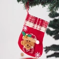 Detail of red Christmas stocking with teddy bear doll and snowflake embroidery on tree - Small Bell Bear Stocking