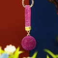 Detail of pink rhinestone keychain ball with golden metal ring on blurred background - Single OPP Bag Packaging / Rose Red