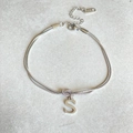 Silver stainless steel double chain bracelet featuring a letter S pendant and K18 hallmark tag - Silver-S