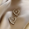 Silver hollow heart-shaped metal stud earrings with smooth minimalist geometric design - E6034 Silver Hollow Heart