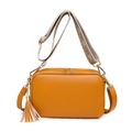 Detail of ginger yellow crossbody bag with litchi texture PU leather and woven strap - Earthy Yellow