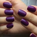Close-up of glossy deep purple press-on nails in elegant long almond shape - Dark Purple Glossy Style (CW189)