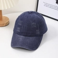 Distressed vintage navy denim baseball hat with ripped detailing on a wooden lamp stand - Navy Blue