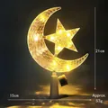 Detail of transparent star and moon tree topper with warm LED lights and 21cm height - 15cm Crystal Star Moon Warm Light