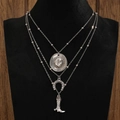 Detail view of silver layered necklace with cowboy hat, horseshoe, and boot pendants - Hat/Horseshoe/Boots Style (A-366) / Antique Silver
