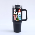Detailed close-up of 40oz black Christmas tumbler featuring LOVE letter pattern and straw - Black LOVE Snowman