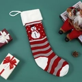 Knitted Christmas stocking with red white grey stripes and cute snowman design - Snowman